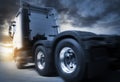 Semi Truck Driving on Road at Sunset Sky. Road Freight Truck Transportat and Logistics. Royalty Free Stock Photo