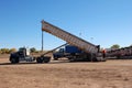 Semi Truck dumping sugarbeets at a Western Sugar pile ground during fall harvest