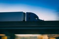 Semi truck on highway overpass concept with motion blur Royalty Free Stock Photo