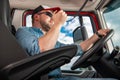 Semi Truck Lorry Driver Talking on CB Radio Royalty Free Stock Photo