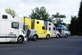 Semi-trucks parked in a rest area. Royalty Free Stock Photo