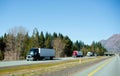 Semi trucks trucking convoy interstate highway California