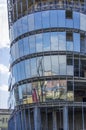 Semicircular blue glass wall of the building