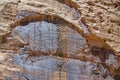 Semicircular patterns in the rockface near Cassidy Arch at Capitol Reef National Park, Utah, USA Royalty Free Stock Photo