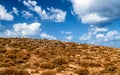 Semidesert and sky with clouds Royalty Free Stock Photo