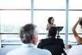 Seminar, presentation and woman presenter in the office boardroom for a business conference. Corporate speech, speaker