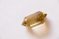 Semiprecious citrine crystal on an isolated background close-up