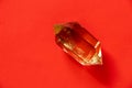 Semiprecious citrine crystal on an isolated background close-up