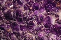 Semiprecious gemstone of amethyst with calcite