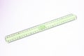 Semitransparent aqua-green ruler used at school or in the office.