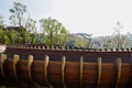 Semitubular wood footbridge in air at sunny winter noon Royalty Free Stock Photo