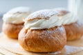 Semla or vastlakukkel is a traditional sweet roll with whipped cream made in Scandinavic, Baltic countries