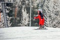 Semmering, Austria. A child is skiing on snow covered slope in austrian Alps. Mountains ski resort