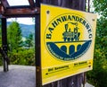 SEMMERING, AUSTRIA, OCTOBER 3, 2015: sign showing direction of the yellow tourist path on the semmeringbahn track in