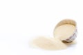 Semolina flour in a white colored bowl isolated on white also known as Sooji or Suji.