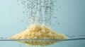 Semolina grains float and separate water creating dynamic movement surface illuminated bright lighting enhances their