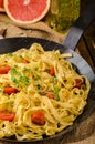 Semolina pasta with roasted garlic, sprinkled microherbs