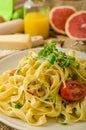 Semolina pasta with roasted garlic, sprinkled microherbs