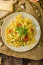 Semolina pasta with roasted garlic, sprinkled microherbs