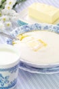 Semolina porridge with fresh butter and milk Royalty Free Stock Photo