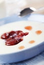 Semolina porridge with strawberry jam Royalty Free Stock Photo