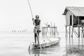 Semporna, Malaysia June 2015: Bajau tribe old men rowing small boat in Semporna sea, Sabah Semporna, Malaysia