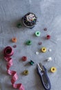 A sempstress inventory: measure tape, buttons, needles, threads and scissors Royalty Free Stock Photo