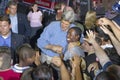 Senator John Kerry embraces African-American child at the Thomas Mack Center at UNLV, Las Vegas, NV