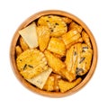 Senbei, Japanese rice crackers, crispy savory snacks, in wooden bowl