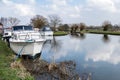 SEND, SURREY/UK - MARCH 25 : Boats moored on the River Wey Navigations Canal at Send in Surrey on March 25, 2015 Royalty Free Stock Photo