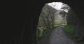 Senda del Oso hiking and bicycle path near cave in the mountain area of Asturias