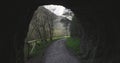 Senda del Oso hiking and bicycle path near cave in the mountain area of Asturias