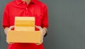 The sender in the red device sends the parcel box to the recipient at home, Deliver packages to recipients quickly, complete Royalty Free Stock Photo