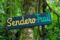 Sendero trail sign nailed to a tree in Boquete Panama