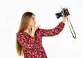 Sending kiss. journalist. woman with retro camera. vintage photographing. professional skilled female photographer. kiss