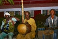 Black men playing traditional african music during night
