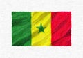 Senegal hand painted waving national flag.