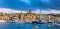 Senglea, Malta - Panoramic vew of yachts and sailing boats mooring at Senglea marina in Grand Canal of Malta Royalty Free Stock Photo