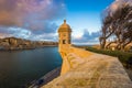 Senglea, Malta - Watch tower of Fort Saint Michael, Gardjola Gardens with the city of Valletta