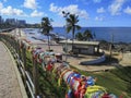 Senhor do Bonfim colorful ribbons tied in a grid at Barra Lighthouse Salvador Bahia