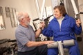 Senior Adult Couple Working Out Together in the Gym Royalty Free Stock Photo