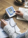 Senior Adult Measuring Blood Pressure Concept