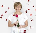 Senior Adult Woman Smiling Happiness Flower Studio Portrait Royalty Free Stock Photo