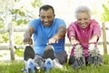 Senior African American Couple Exercising In Park Royalty Free Stock Photo