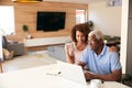 Senior African American Couple Using Laptop To Check Finances At Home Royalty Free Stock Photo