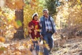 Senior African American Couple Walking Through Fall Woodland Royalty Free Stock Photo