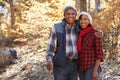 Senior African American Couple Walking Through Fall Woodland Royalty Free Stock Photo