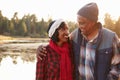 Senior African American Couple Walking By Lake Royalty Free Stock Photo