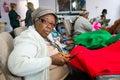 Senior African American female doing arts and crafts at an event Royalty Free Stock Photo