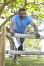 Senior African American Man Exercising In Park Royalty Free Stock Photo